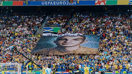 'Peace has a price': Football fans display mosaic of fallen Ukrainian soldiers at Euro 2024 match