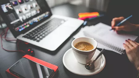 Being a coffee drinker might be good for your heart health if you sit down all day for work