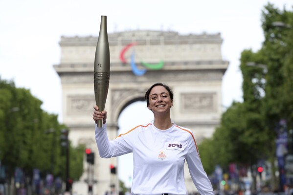 Who is carrying the Olympic torch through Paris? A BTS star, a garbage collector and more