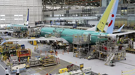 Troubled plane maker Boeing names new CEO as it reveals billion-dollar loss