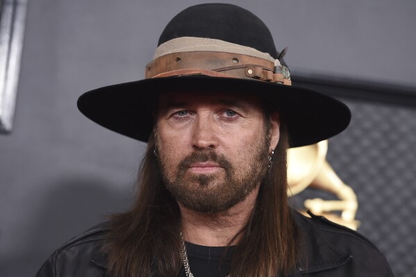 Billy Ray Cyrus finalizes divorce from singer Firerose 3 months after filing