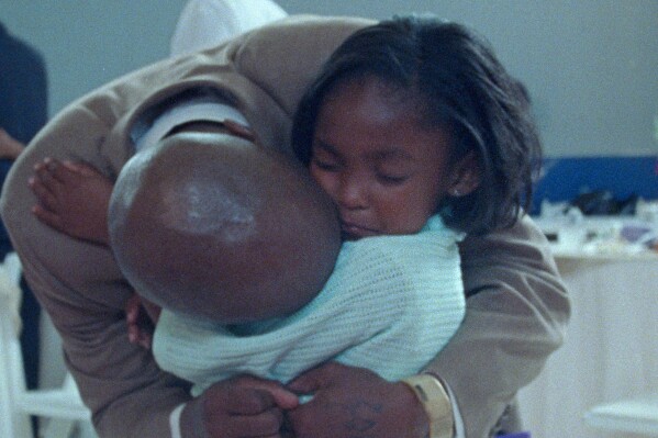 Incarcerated fathers and daughters reunite at a daddy-daughter dance in Netflix documentary