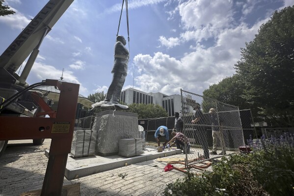 Bronze statue of John Lewis replaces more than 100-year-old Confederate monument