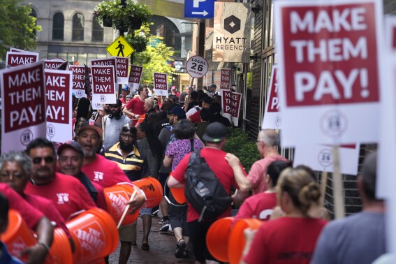 Strikes start at top hotel chains as housekeepers seek higher wages and daily room cleaning work