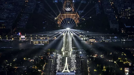 Paris mayor vows Olympic rings will stay on the Eiffel Tower – but not everyone is happy