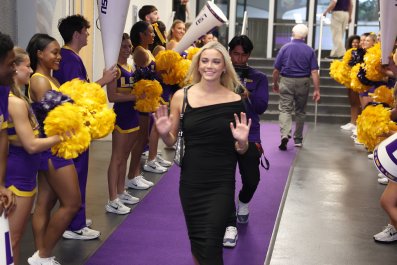 Livvy Dunne Looks Just Like Fan-Favorite Emoji With Teammate Chase Brock at LSU Game