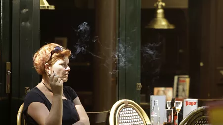 Where in Europe are there restrictions on smoking outdoors?