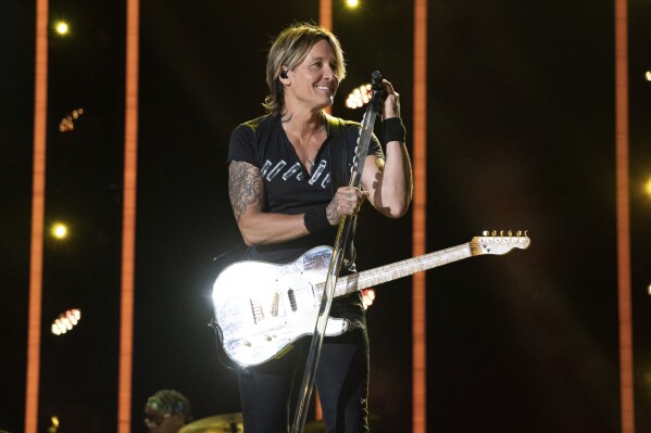 Keith Urban says ‘High’ is about order and chaos, with songs about love, life and his late father