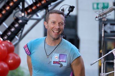 Chris Martin Takes Scary Tumble Through Stage Door at Melbourne Show